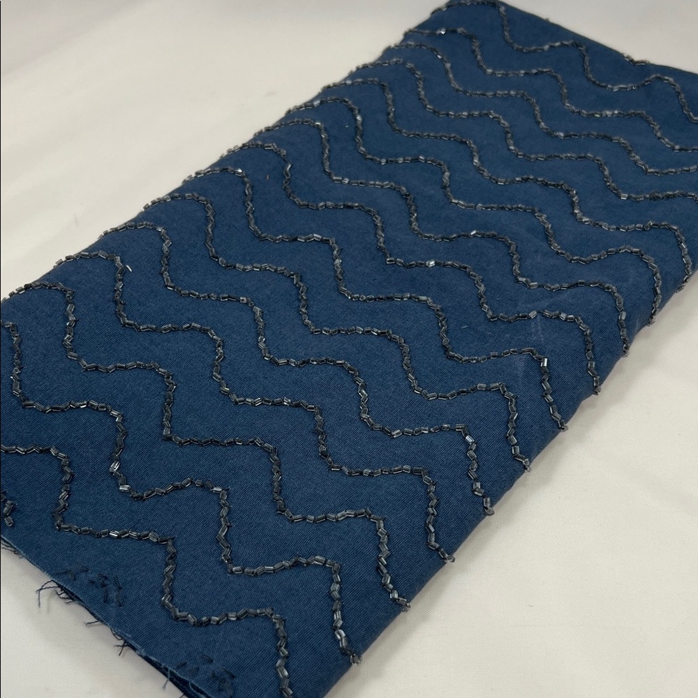 Beaded fabric piece